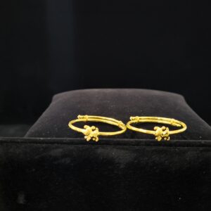 Golden Pup Gold Bangle - Discover Artistic jewelry shop near RS Puram, modern gold designs Coimbatore, and Charvi Jewels Designs, the best Gold jewellers RS Puram Coimbatore.